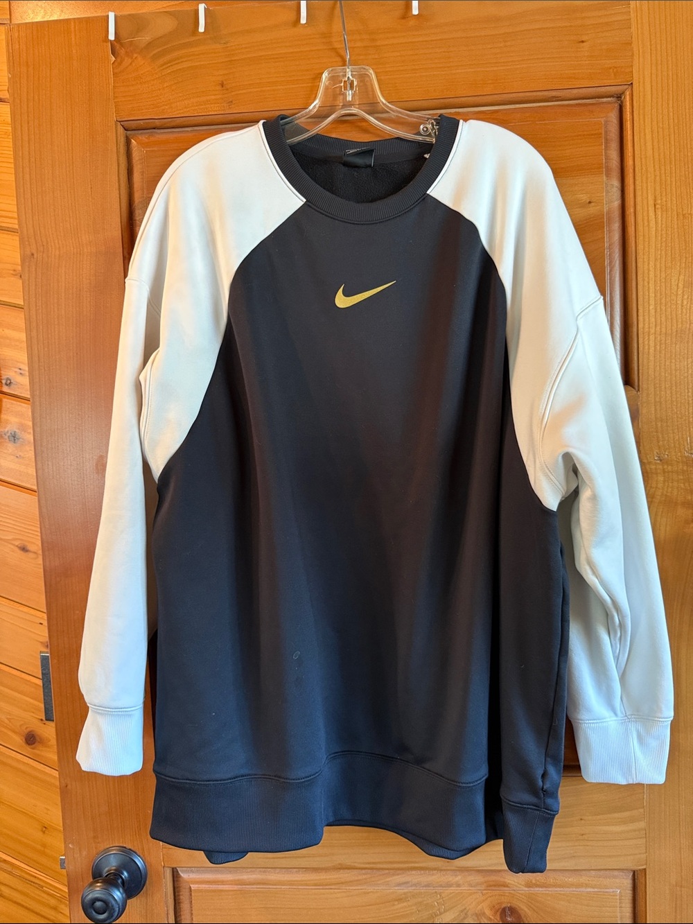 Nike Black Crewneck with White Raglan Sleeves and Gold Swoosh